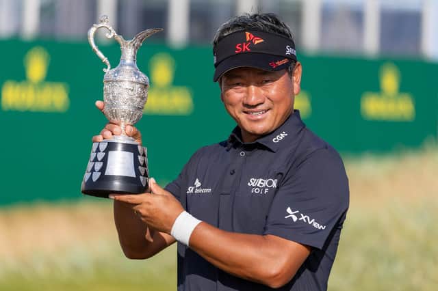 Korea's KJ Choi shows off the trophy after winning the Senior Open Championship presented by Rolex at Carnoustie Golf Links. Picture: Kenny Smith/Getty Images.