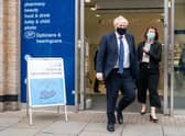 Prime Minister Boris Johnson leaves the Boots Pharmacy in Uxbridge, west London, after a visit to the coronavirus vaccination clinic. Picture: Dominic Lipinski/PA Wire