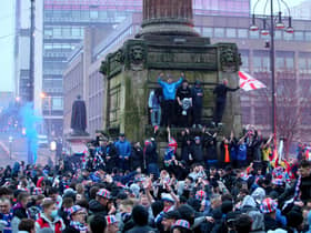 Police said arrests were made and fines were issued after people broke lockdown rules in George Square (PA Media)