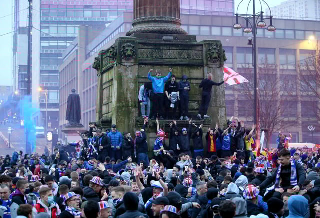 Police said arrests were made and fines were issued after people broke lockdown rules in George Square (PA Media)