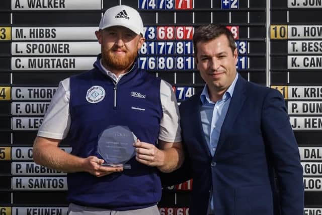 Jamie Savage shows off his trophy after winning the Portugal Pro Tour's season-ending Optilink Tour Championship. Picture: Portugal Pro Tour.