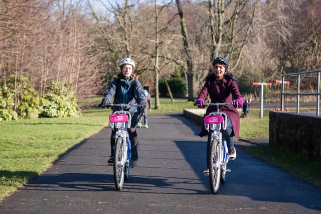 Cyclists using nextbike bikes in Glasgow.