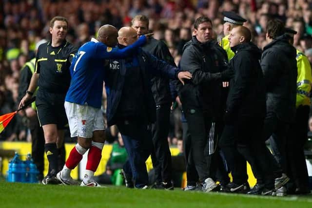 Rangers forward El Hadji Diouf gesticulates angrily at Celtic manager Neil Lennon during the tempestuous Scottish Cup last 16 replay at Celtic Park on March 2, 2011. (Photo by Alan Harvey/SNS Group).