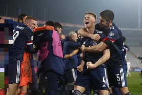 BELGRADE, SERBIA - NOVEMBER 12: Scott McTominay of Scotland and Declan Gallagher of Scotland celebrate after the UEFA EURO 2020 Play-Off Final between Serbia and Scotland at Rajko Mitic Stadium on November 12, 2020