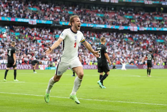 England captain Harry Kane celebrates after scoring his team's second goal in the 2-0 defeat of Germany at Wembley on Tuesday. (Photo by Catherine Ivill/Getty Images)