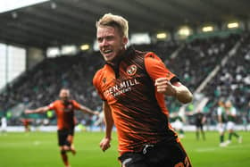 Dundee United's Kieran Freeman celebrates his goal in the 3-0 win over Hibs at Easter Road. (Photo by Ross MacDonald / SNS Group)