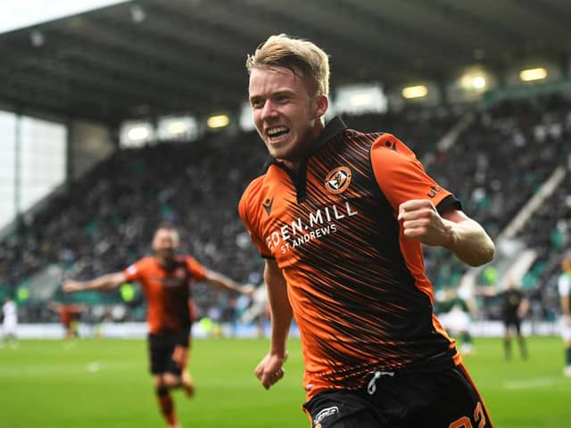 Dundee United's Kieran Freeman celebrates his goal in the 3-0 win over Hibs at Easter Road. (Photo by Ross MacDonald / SNS Group)