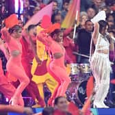 Fans look on as Camila Cabello performs in the pre-match show ahead of the Uefa Champions League final (Picture: David Ramos/Getty Images)