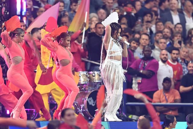 Fans look on as Camila Cabello performs in the pre-match show ahead of the Uefa Champions League final (Picture: David Ramos/Getty Images)
