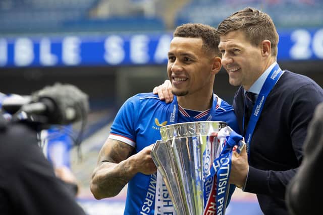 Rangers captain James Tavernier and manager Steven Gerrard with the Scottish Premiership Trophy at full time during the Scottish Premiership match between Rangers and Aberdeen at Ibrox Stadium, on May 15, 2021, in Glasgow, Scotland. (Photo by Craig Williamson / SNS Group)