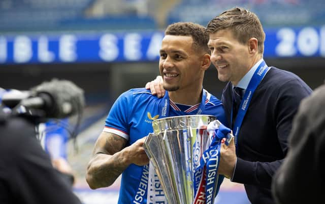 Rangers captain James Tavernier and manager Steven Gerrard with the Scottish Premiership Trophy at full time during the Scottish Premiership match  between Rangers and Aberdeen  at Ibrox Stadium, on May 15, 2021, in Glasgow, Scotland. (Photo by Craig Williamson / SNS Group)