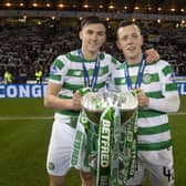 Callum McGregor celebrates Celtic's 2018 Betfred Cup win with Kieran Tierney and is now enjoying watching the full-back in his role as Arsenal main man in the docuseries going behind the scenes at the London club. (Photo by Craig Williamson/SNS Group).
