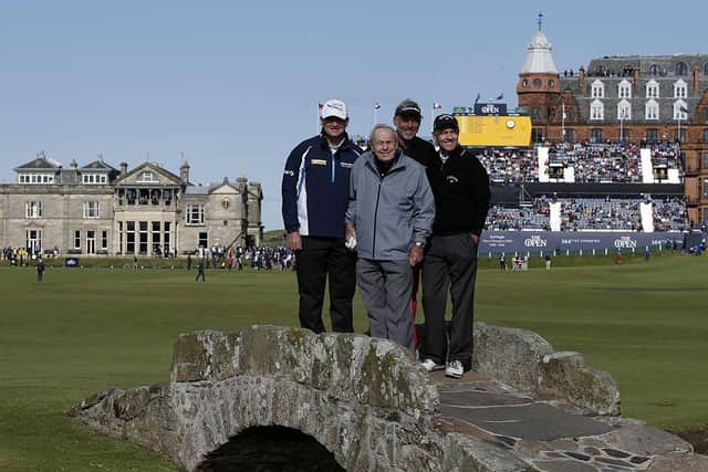 Paul Lawrie with Arnold Palmer, Darren Clarke and Bill Rogers on the Swilcan Bridge during the Champion Golfers' Challenge ahea of the 2015 Open at St Andrews. Picture: Adrian Dennis/AFP via Getty Images.