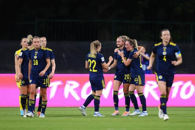 The Scotland team celebrate Martha Thomas' goal against Ukraine in June (Photo by Adam Nurkiewicz/Getty Images)