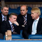 Four days after taking ownership of Rangers, Craig Whyte (centre) in discussion with (from left) David Grier, Gary Withey, Phil Betts and Donald Muir before a match against Dundee United at Ibrox. (Photo by Alan Harvey/SNS Group).