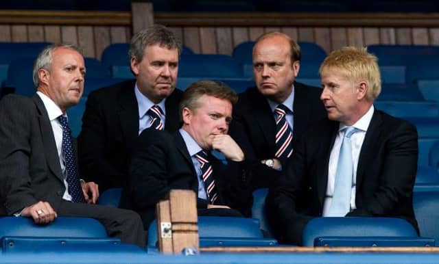 Four days after taking ownership of Rangers, Craig Whyte (centre) in discussion with (from left) David Grier, Gary Withey, Phil Betts and Donald Muir before a match against Dundee United at Ibrox. (Photo by Alan Harvey/SNS Group).
