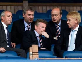 Four days after taking ownership of Rangers, Craig Whyte (centre) in discussion with (from left) David Grier, Gary Withey, Phil Betts and Donald Muir before a match against Dundee United at Ibrox. (Photo by Alan Harvey/SNS Group).