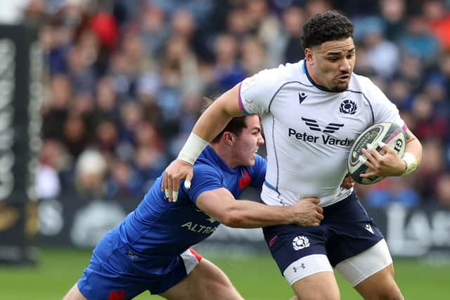 Sione Tuipulotu gets away from France's Antoine Dupont during the Six Nations match at BT Murrayfield in February. (Photo by Craig Williamson / SNS Group)