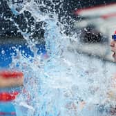 Adam Peaty celebrates winning gold in the Men's 100m Breaststroke Final on day three of the Tokyo 2020 Olympic Games at the Tokyo Aquatics Centre