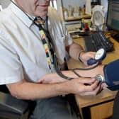 GPs have had to make "difficult choices" about which patients to see during the Covid pandemic, a senior Scottish Government adviser said.