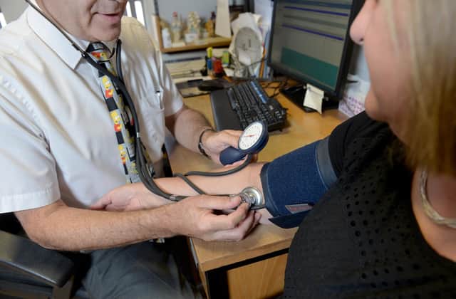 GPs have had to make "difficult choices" about which patients to see during the Covid pandemic, a senior Scottish Government adviser said.