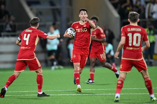 Aberdeen's Bojan Miovski celebrates after starting the fightback against BK Hacken in Gothenburg.