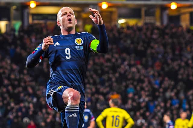 Celebrating his final goal for Scotland against Kazakhstan in his last-ever appearance.