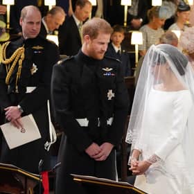 Prince William (left) watching Prince Harry and Meghan Markle during their wedding at St George's Chapel at Windsor Castle. Picture: Jonathan Brady/PA Wire
