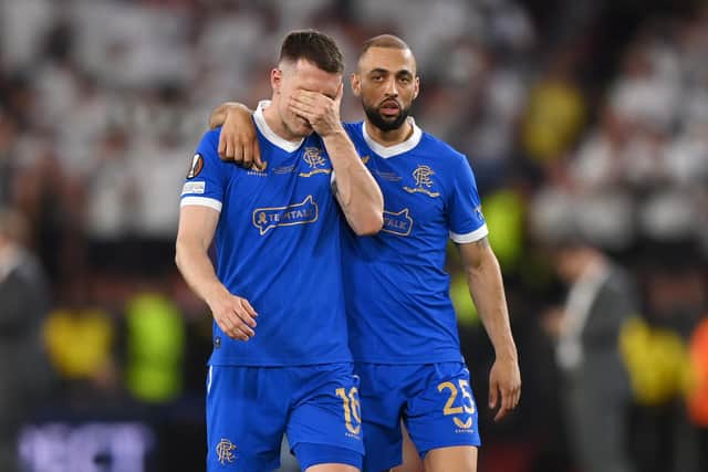 Rangers midfielder Aaron Ramsey is consoled by Kemar Roofe after missing the decisive penalty in the shoot-out as Eintracht Frankfurt won the Europa League final. (Photo by Justin Setterfield/Getty Images)
