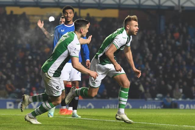 Ryan Porteous celebrates after putting Hibs 1-0 ahead at Ibrox. (Photo by Craig Foy / SNS Group)