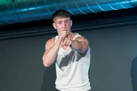 Alfie on stage at the Behind the Goals venue at Easter Road stadium