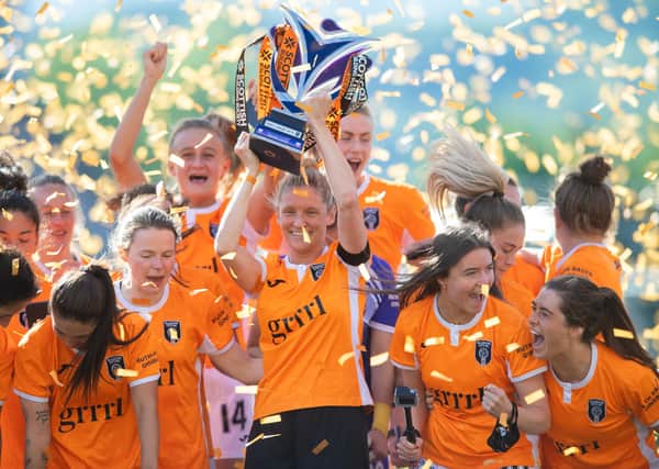 Leanne Ross of Glasgow City lifts the SWPL title. (Photo by Mark Scates / SNS Group)
