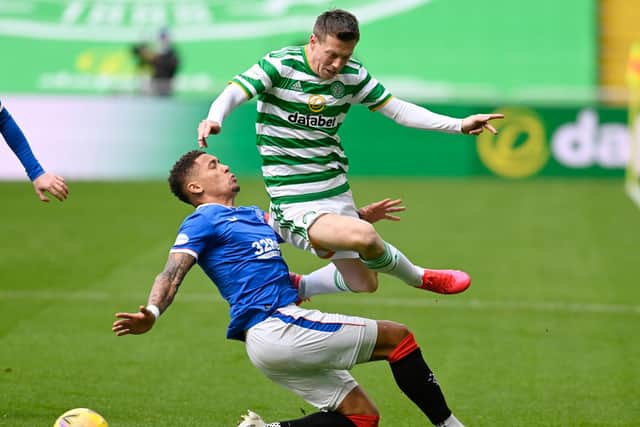Celtic's Callum McGregor is tackled by Rangers' James Tavernier (left) in the 2-0 derby defeat for the Scottish champions (Photo by Rob Casey / SNS Group)
