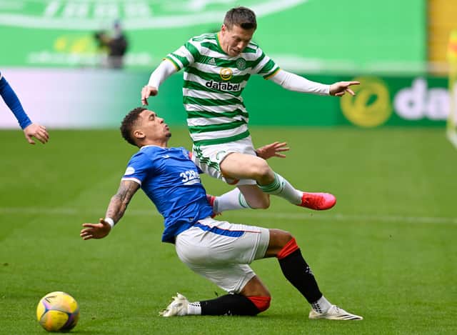 Celtic's Callum McGregor is tackled by Rangers' James Tavernier (left) in the 2-0 derby defeat for the Scottish champions (Photo by Rob Casey / SNS Group)