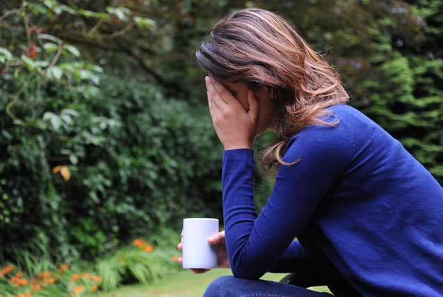 The symptoms of PMDD, a severe form of PMS, include headaches, joint and muscle pain, mental and emotional problems (Picture: Anna Gowthorpe/PA)