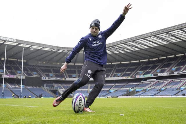 Scotland stand-off Finn Russell practises his kicking during the captain's run training session at Murrayfield ahead of the Six Nations match with France. (Photo by Craig Williamson / SNS Group)