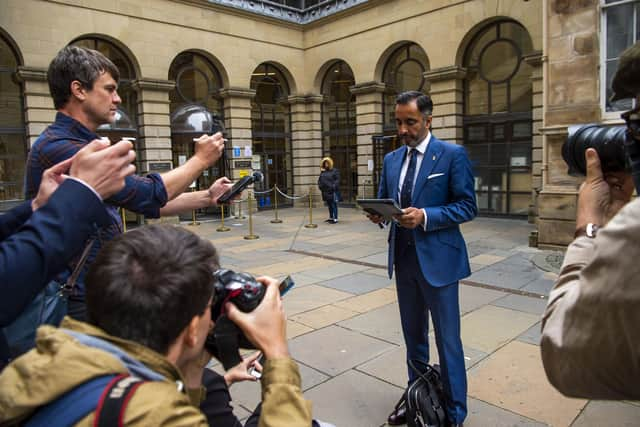 Clara Ponsati's lawyer Aamer Anwar speaks outside of court on behalf of his client. Picture: Lisa Ferguson