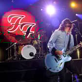 The Foo Fighters perform on stage with the late, great Taylor Hawkins (Photo by Kevin Winter/Getty Images for iHeartMedia)