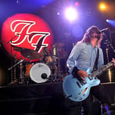The Foo Fighters perform on stage with the late, great Taylor Hawkins (Photo by Kevin Winter/Getty Images for iHeartMedia)
