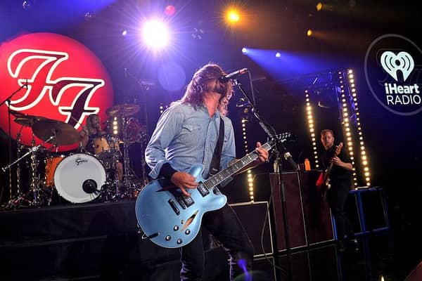 The Foo Fighters perform on stage with the late, great Taylor Hawkins (Photo by Kevin Winter/Getty Images for iHeartMedia)