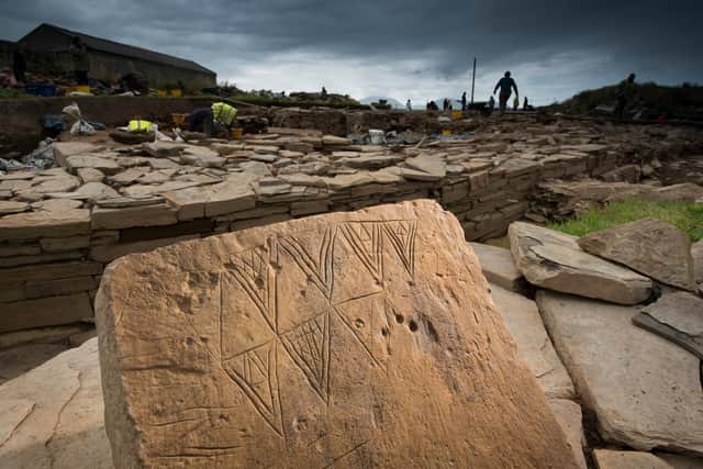 A piece of 'butterfly stone' excavated from the Ness of Brodgar, with the design later found across the country.  A piece of the decorated stonework will go on show at the World of Stonehenge exhibition at the British Museum. PIC: Jim Richardson.