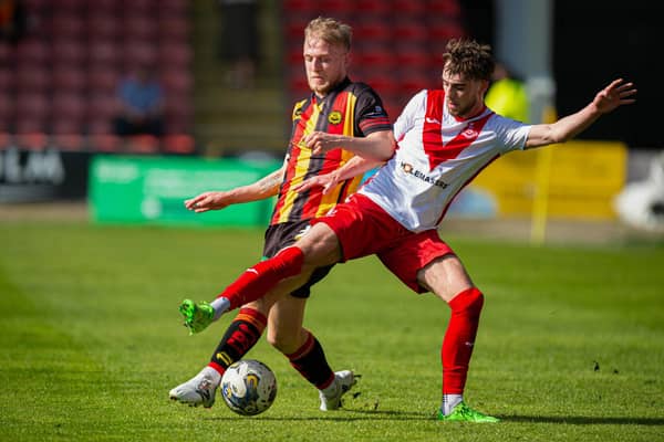 Partick's Harry Milne (L) and Airdrie's Lewis McGregor - the two sides will compete in the Premiership play-off quarter-final this week.  (Photo by Paul Byars / SNS Group)