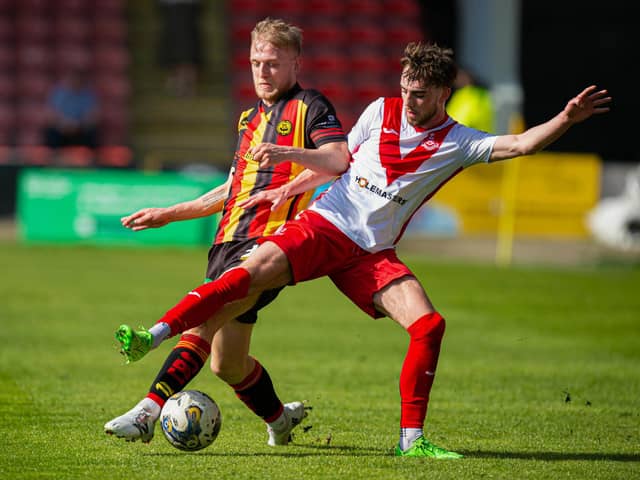 Partick's Harry Milne (L) and Airdrie's Lewis McGregor - the two sides will compete in the Premiership play-off quarter-final this week.  (Photo by Paul Byars / SNS Group)
