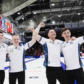 Scotland celebrate their win over Canada at the World Championships.