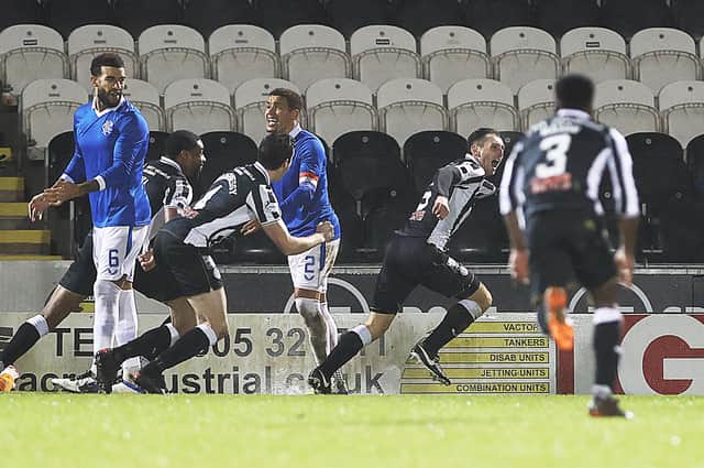 Conor McCarthy of St Mirren celebrates with Joe Shaughnessy after scoring their team's third and winning goal during the Betfred Cup Quarter-Final match between St Mirren and Rangers at The Simple Digital Arena on December 16, 2020 in Paisley, Scotland. The match will be played without fans, behind closed doors as a Covid-19 precaution. (Photo by Ian MacNicol/Getty Images)
