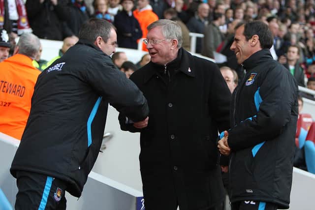 Steve Clarke, then West Ham assistant manager, shakes hands with Man Utd boss Alex Ferguson prior to a match in 2009
