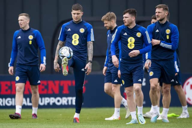 Dykes and Scotland captain Andy Robertson train at Lesser Hampden.