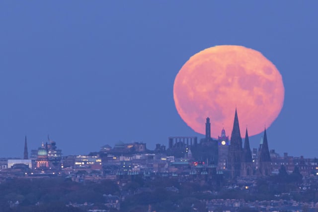 The hunter's moon illuminates the Scottish capital.