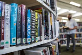 The ability to borrow the latest titles keeps Alastair Dalton returning to the library shelves. (Photo by Lisa Ferguson/The Scotsman)
