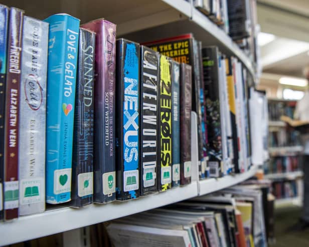 The ability to borrow the latest titles keeps Alastair Dalton returning to the library shelves. (Photo by Lisa Ferguson/The Scotsman)